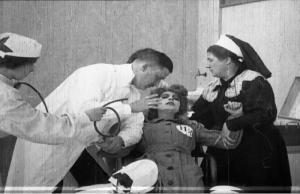 Asta Nielsen as suffrage activist Nelly Panburne being force fed in The Suffragette (1913). 