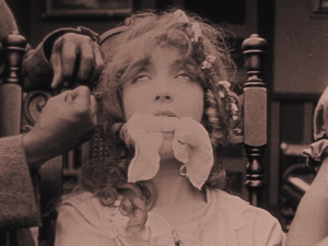 The very picture of imperilled femininity, Elsie Stoneman (Lillian Gish) awaits her forced marriage to the mixed race Silas Lynch in The Birth of a Nation.